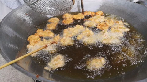 Fried fish paste balls on street food famous in the Bangkok city Thailand. Stock Footage 141142100