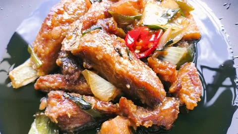 Fried fish in plate fly view Stock Footage 343621914