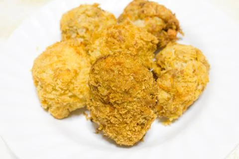 Fried fish on the plate Stock Photos