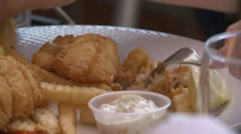 Fried fish platter at a Bistro (1 of 2) Video stock 8981659