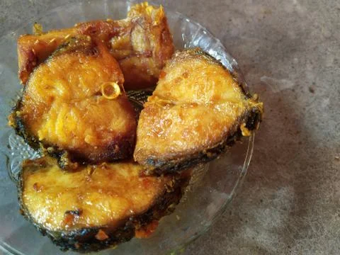 Fried fish, ready to cook Stock Photos