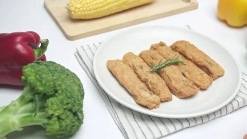 Fried fish roll served on a plate Stock Footage 247828003
