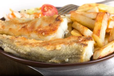 Fried fish - saffron cod or navaga Stock Photos