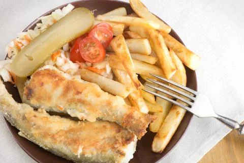 Fried fish - saffron cod or navaga Stock Photos