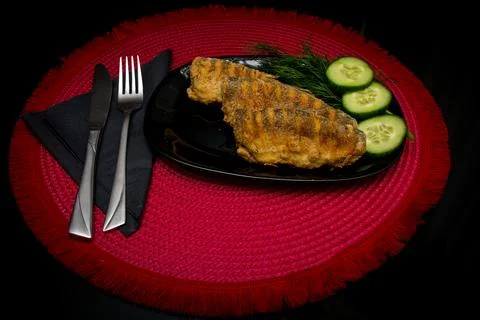 Fried fish served on a plate Foto stock