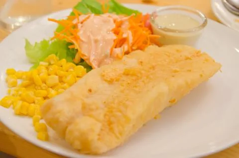 Fried fish steak Stock Photos