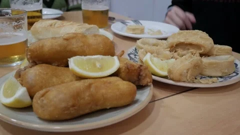 Fried Fish Tapas and Beer in Elche, Alicante: A Taste of Spain Stock Footage 328698018
