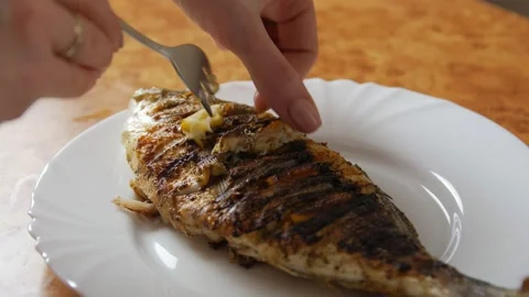 Fried Fish Tasting Stock Footage 146440947