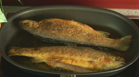Fried fish turned close Stock Footage 91741