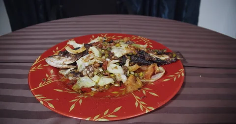 Fried fish with vegetable Stock Footage 141203451