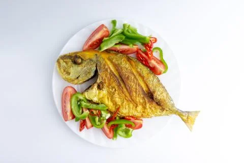 Fried fish on white background with selective focus Fotos Stock