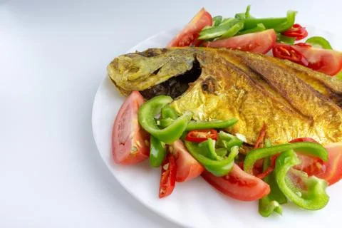 Fried fish on white background with selective focus 写真素材