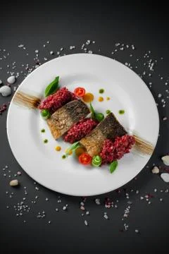 Fried fish on white dish Stock Photos