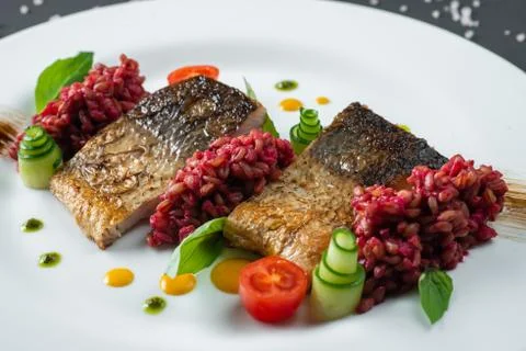Fried fish on white dish Stock Photos