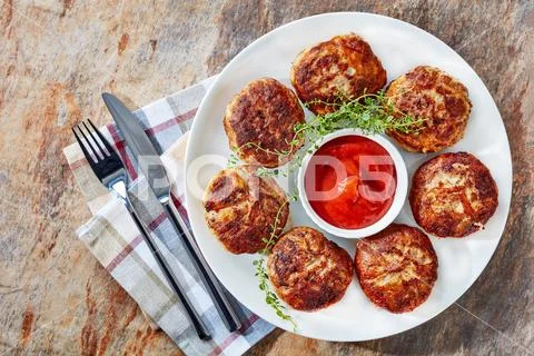 Fried flat sausages consisting of minced meat Stock Photos