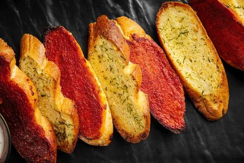 Fried garlic bread appetizer with sauce Stock Photos