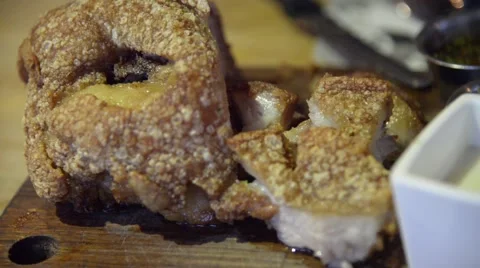 Fried German pork knuckle (eisbein) eating Stock Footage 63302402