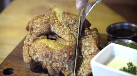 Fried German pork knuckle (eisbein) eating Stock Footage 63302630