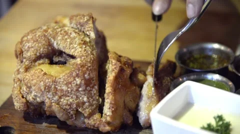 Fried German pork knuckle (eisbein) eating Stock Footage 63302914