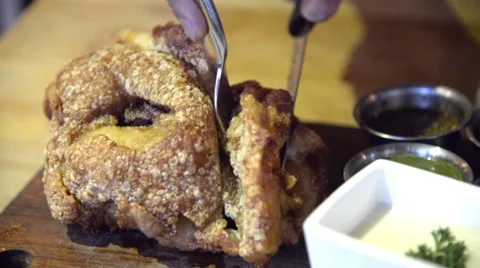 Fried German pork knuckle (eisbein) eating Stock Footage 63302919