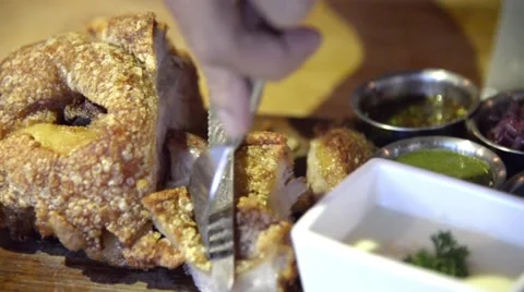 Fried German pork knuckle (eisbein) eating Stock Footage 63303070