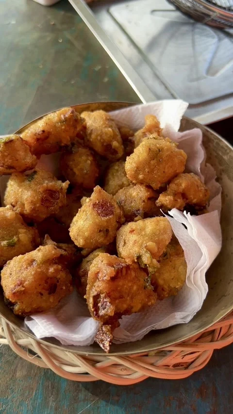 Fried Gram Beans pakora or mong dal pakoda  in a bowl. Stock Footage 286215586