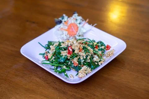 Fried gurmar leaf with egg Foto stock