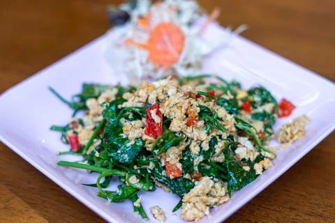 Fried gurmar leaf with egg Foto stock