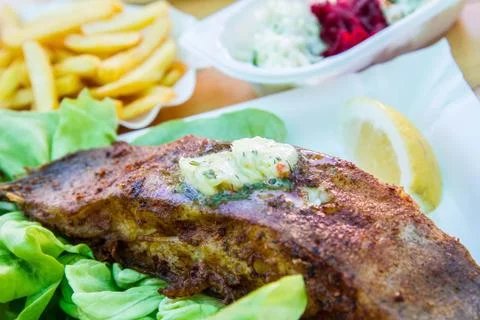 Fried halibut fish Stock Photos