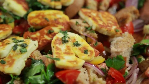 Fried halloumi with vegetables Stock Footage 139872360