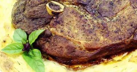 Fried ham with mashed potatoes Stock Photos