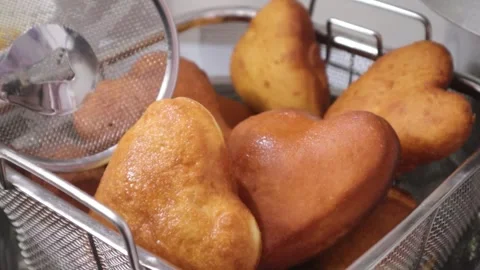 Fried heartshape donut Stock Footage 328013322