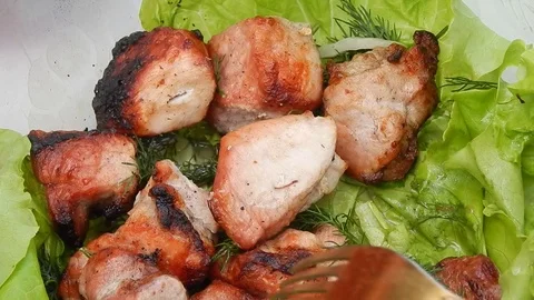 Fried kebab with lettuce close-up Stock Footage 76774855