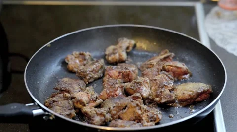 Fried liver in a frying pan Stock Footage 68319161
