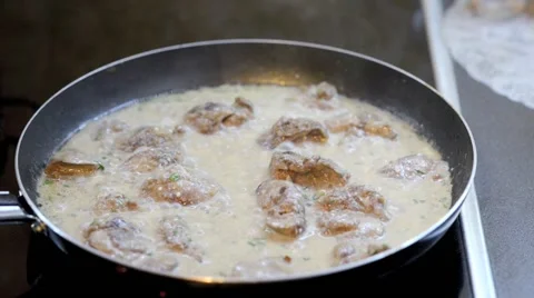 Fried liver in a frying pan Stock Footage 68319183