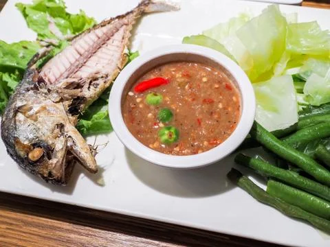 Fried mackerel and vegetable Stock Photos