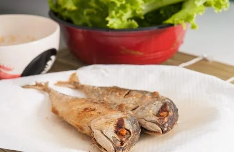 Fried mackerel fish Stock Photos