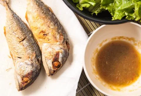 Fried mackerel fish Stock Photos