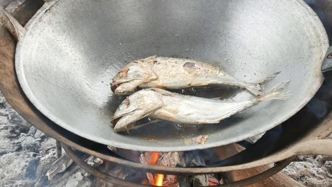 Fried mackerel on pan. Stock Footage 105712943