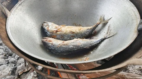 Fried mackerel on pan. Stock Footage 105713051