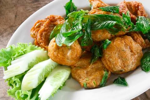 Fried mackerel paste balls in white plate Stock Photos