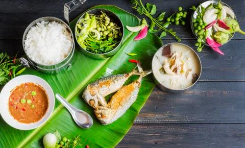 Fried mackerel with shrimp paste sauce with jasmine rice and chicken tom kha  Stock Photos