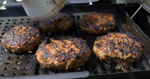Fried Meat Cutlets on Grill. Brush Spread Sauce. Meat dish is Prepared on Picnic Stock Footage 132336387