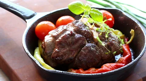 Fried meat in a frying pan Stock Footage 51626624