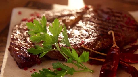 Fried meat with green in slow motion Stock Footage 67857289