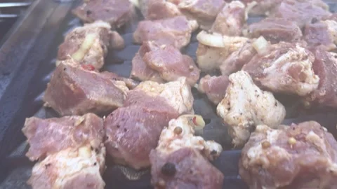 Fried meat on the grill outdoors Video stock 230083386