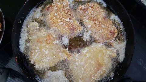 Fried meat in a pan Stock Footage 72973044