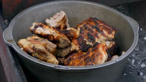 Fried meat in a saucepan Stock Footage 88773088