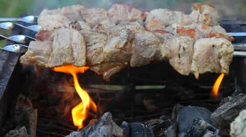 Fried meat on skewers Video stock 60063466