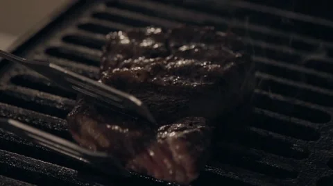 Fried meat in slow motion Stock Footage 67860849